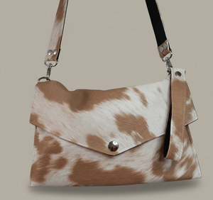 Sac pochette bandoulière simili cuir imprimé peau de vache